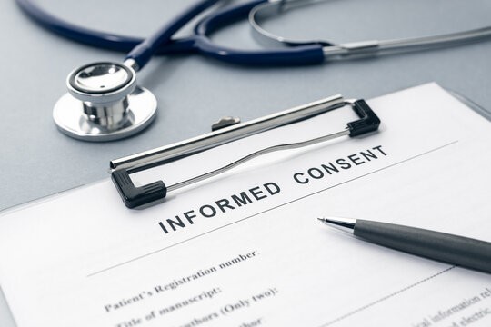 Informed Consent form with stethescope and pen